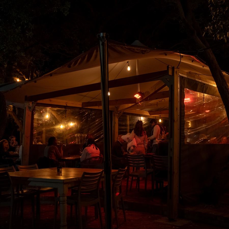 The terrace under the trees at night